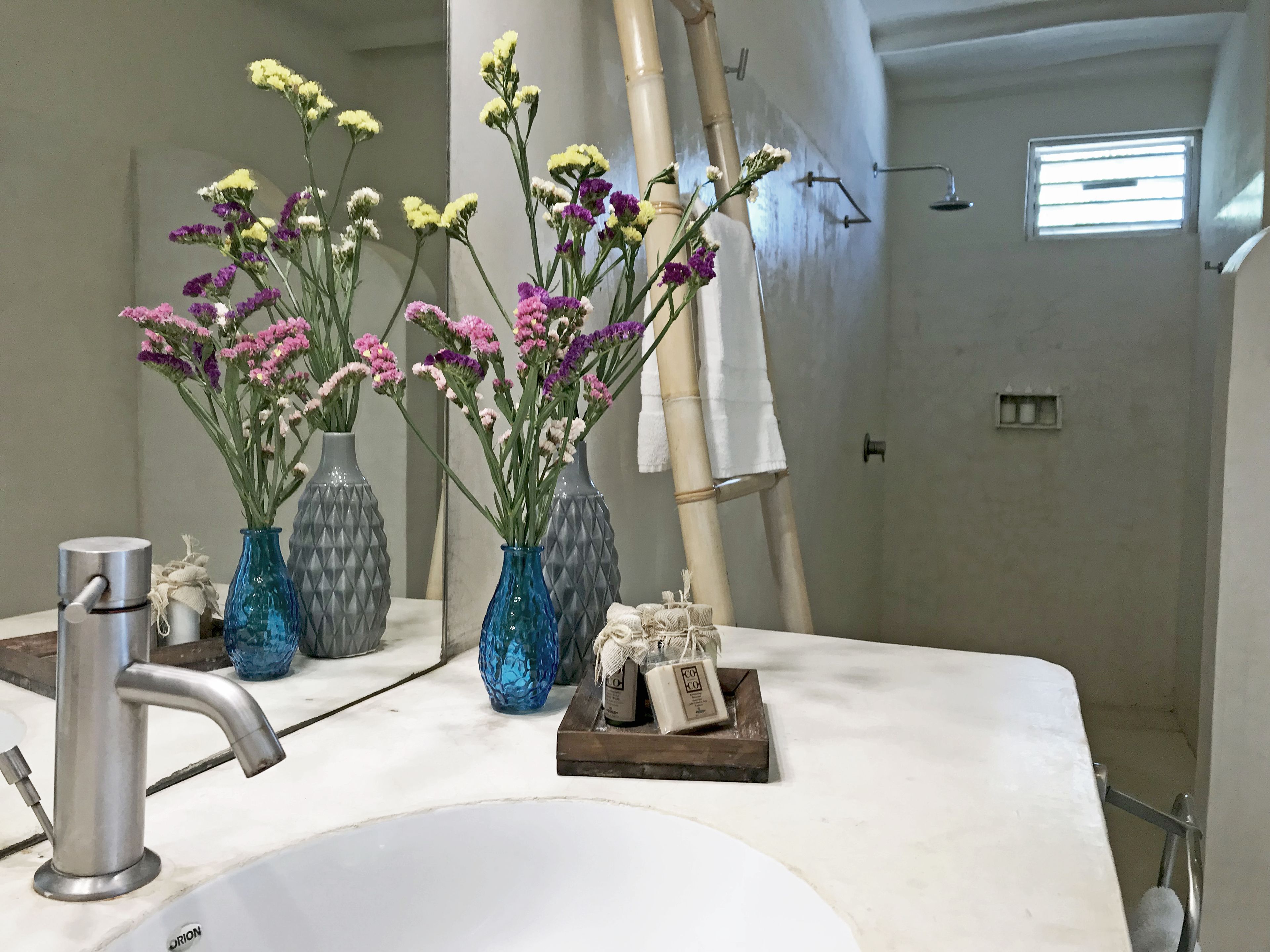 deluxe suite, oceanfront | bathroom | shower, free toiletries, towels, soap