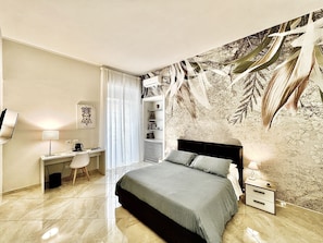 Quarto triplo luxo | Edredons de pluma, camas com colchões de espuma com sistema de memória