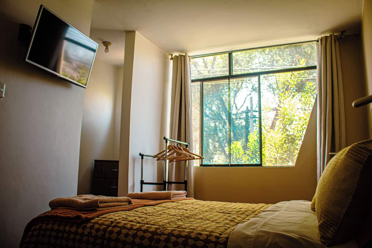 6 bedrooms, blackout drapes, iron/ironing board, free WiFi