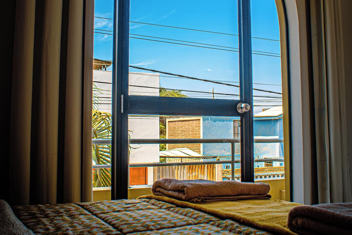 6 bedrooms, blackout drapes, iron/ironing board, free WiFi