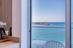 A hotel room with a view of the sea and a pier. - Kahlua Boutique Hotel (Hersonissos)