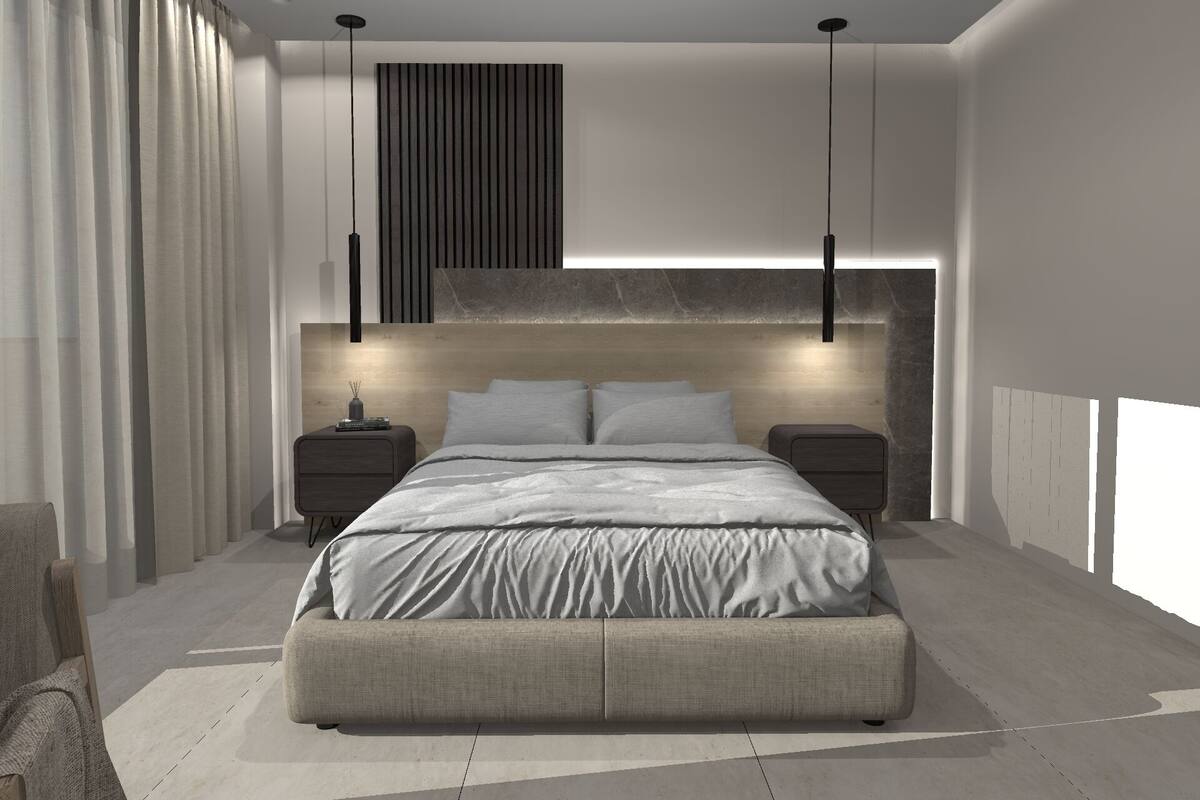 A modern bedroom with a large bed, bedside tables, a headboard with vertical lines, and pendant lighting.