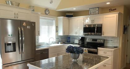 Nestled between Beach and River. 3 minute walk to Beach! 2 minutes to River!