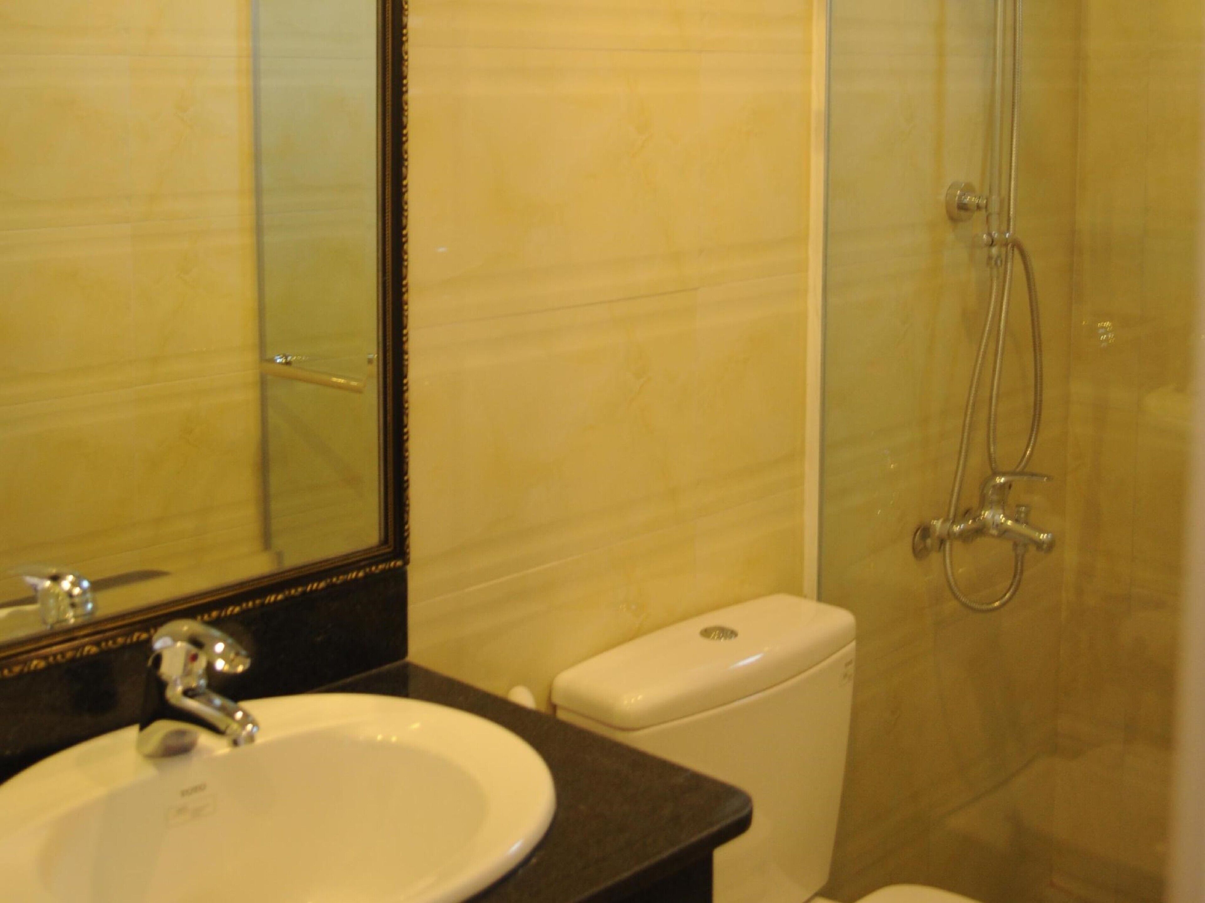 superior double room | bathroom | shower, free toiletries, hair dryer, slippers