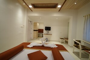Suite, 1 Queen Bed | Premium bedding, minibar, in-room safe, desk - Hotel Palmyra Grand Inn (Tirunelveli)