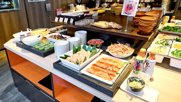 A buffet with various food items and condiments. - Smile Hotel PREMIUM SAPPOROSUSUKINO (Sapporo)