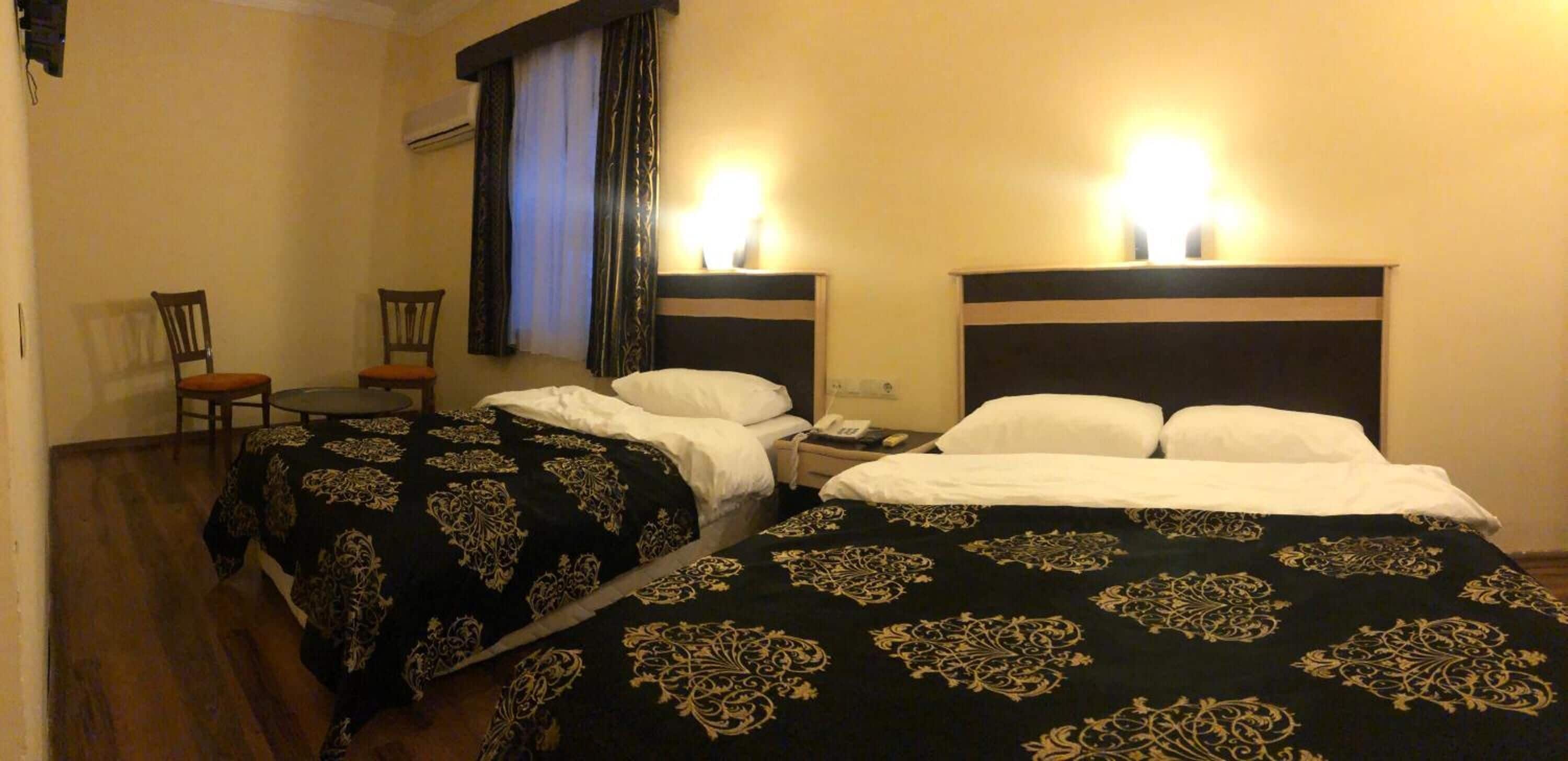 economy twin room | minibar, desk, laptop workspace, soundproofing