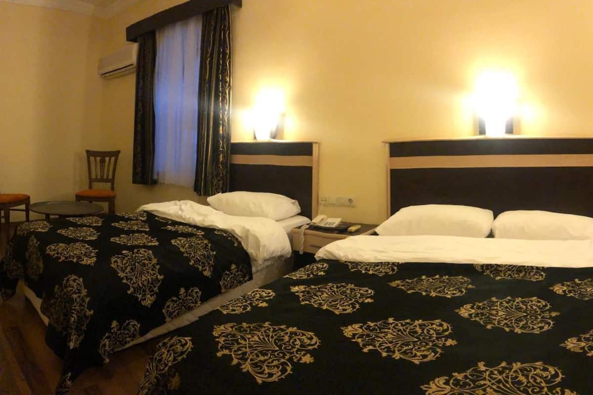 economy twin room | minibar, desk, laptop workspace, soundproofing