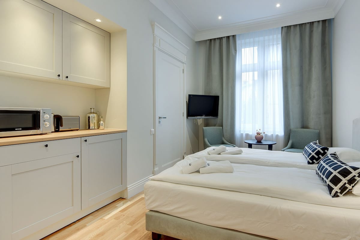 Studio, privébadkamer (max. 2 adults) | Een strijkplank/strijkijzer, babybedden (toeslag), gratis wifi