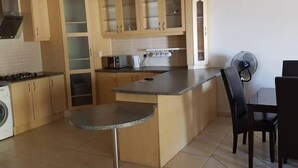 Apartment, 1 Bedroom, Kitchen | Private kitchen | Fridge, microwave, oven, electric kettle
