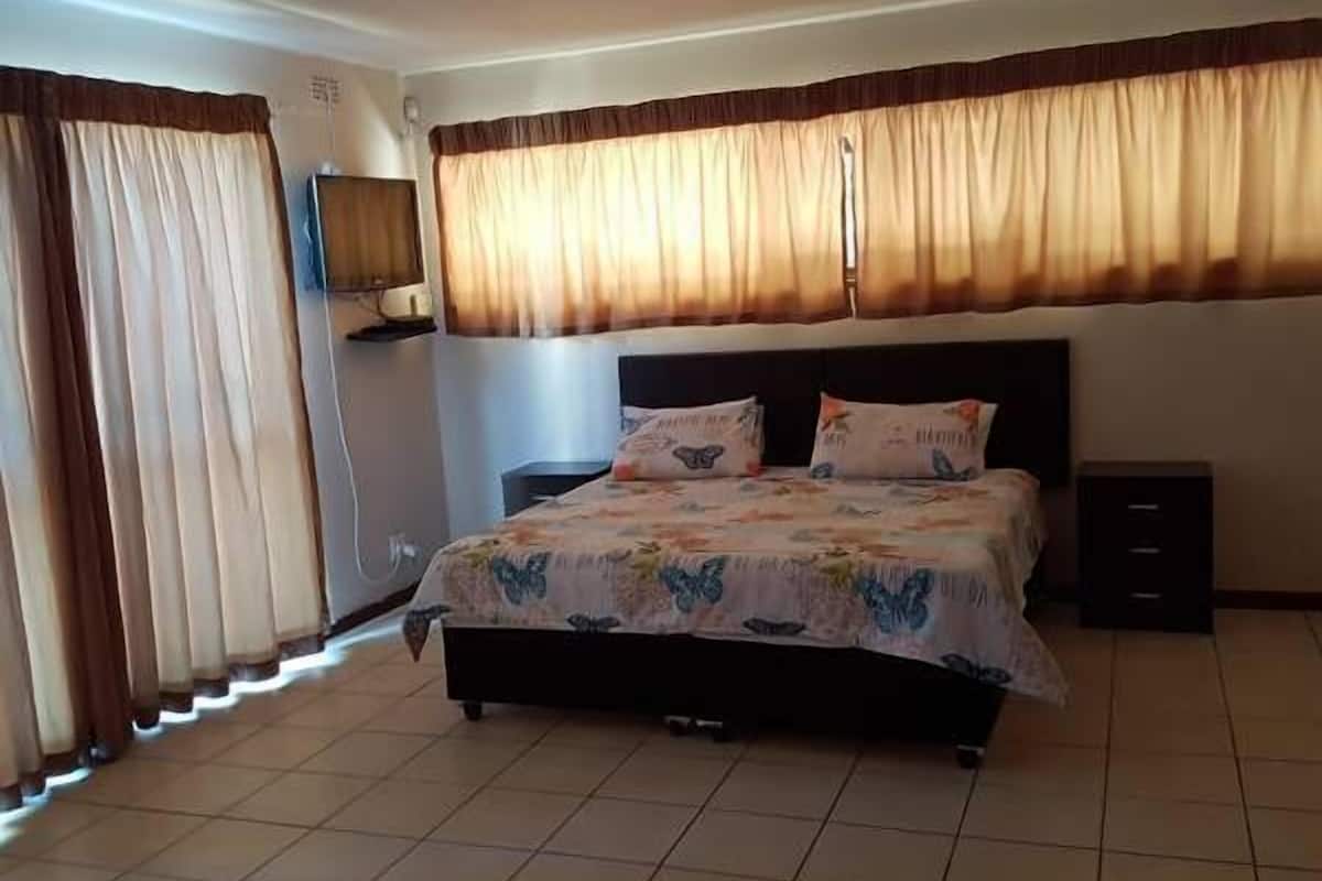 Apartment, 1 Bedroom, Kitchen | 1 bedroom, desk, blackout curtains, iron/ironing board