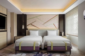 Premium bedding, in-room safe, blackout drapes, soundproofing