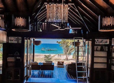 Minibar, bed sheets. Baba Ecolodge