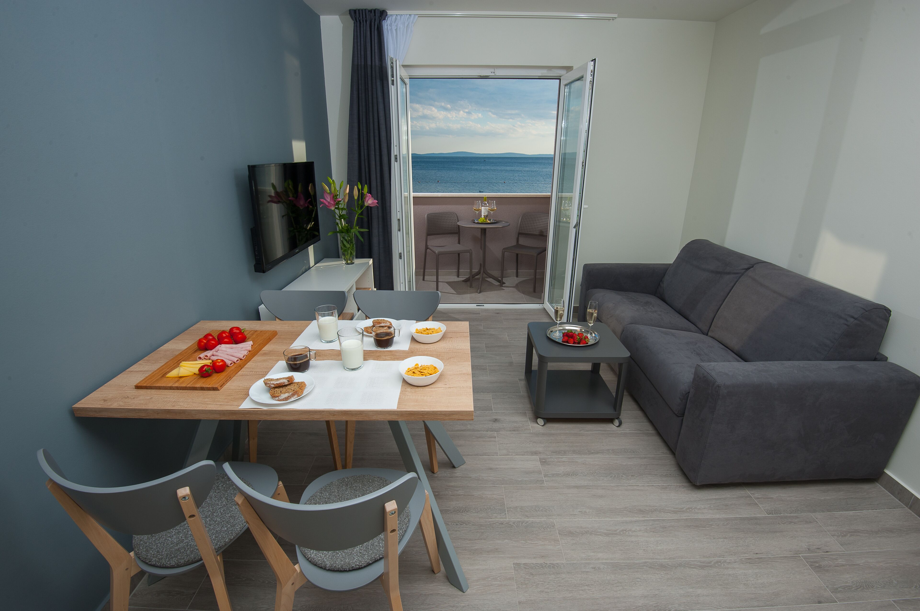 Apartment, Sea View (M2) | Living area | LCD TV