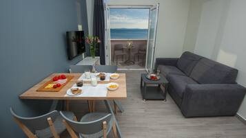 Apartment, Sea View (M2) | Living area | LCD TV