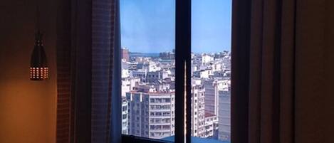 Room | Minibar, blackout drapes, soundproofing, iron/ironing board