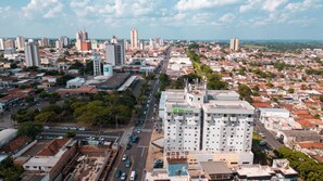 A high-rise hotel with multiple floors, a prominent "NOSO HOTEL" sign, and a view of the surrounding cityscape. - ibis Styles Presidente Prudente Portal D'Oeste (Presidente Prudente)