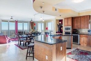 Condo, 4 Bedrooms | Private kitchen | Fridge, microwave, oven, coffee/tea maker
