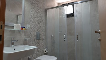 Shower, free toiletries, hair dryer, slippers