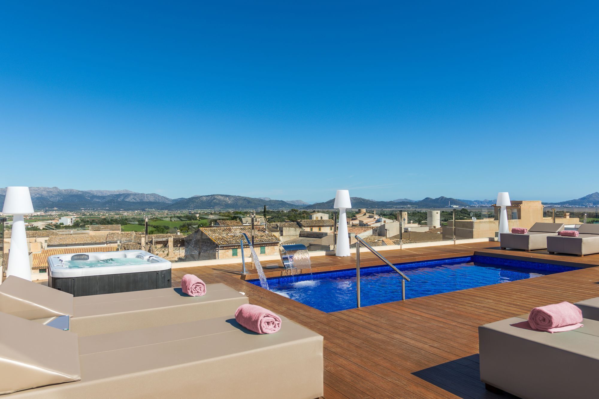 outdoor pool, pool umbrellas, pool loungers