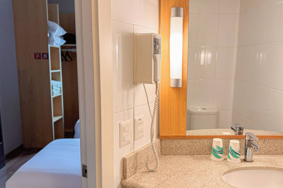 standard twin room, 2 single beds | bathroom | shower, eco-friendly toiletries, towels