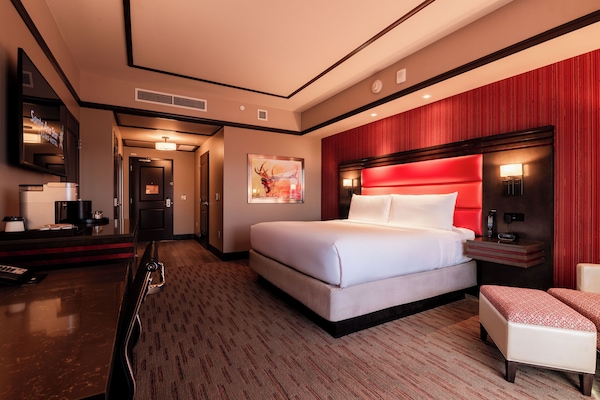 Premium bedding, down comforters, pillowtop beds, in-room safe