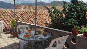 Economy Quadruple Room | Terrace/patio
