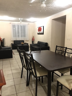 Apartment, 3 Bedrooms | Living area | 40-inch flat-screen TV with cable channels, TV