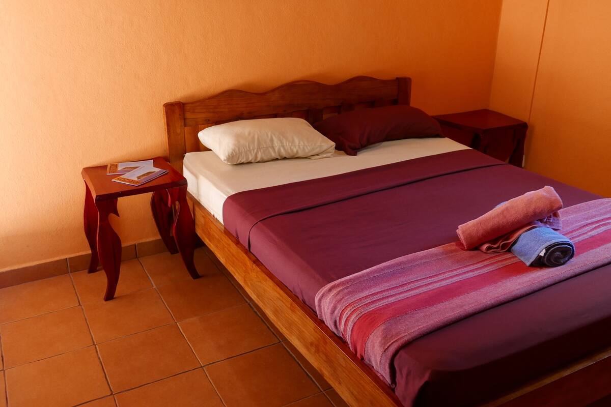 Deluxe Triple Room, Private Bathroom | 1 bedroom, WiFi (free), bed sheets