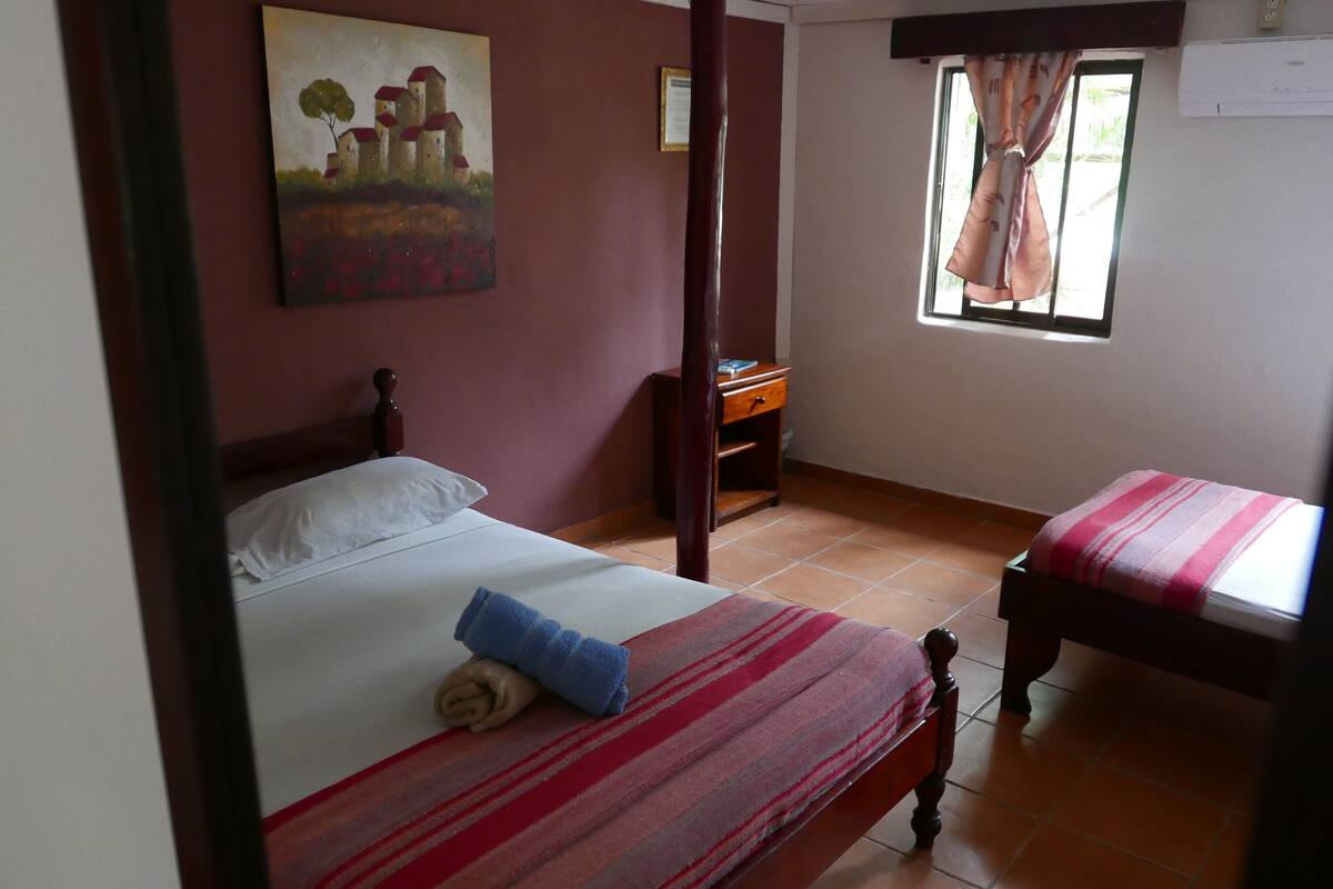 Economy Triple Room, Multiple Beds, Shared Bathroom | 1 bedroom, WiFi (free), bed sheets