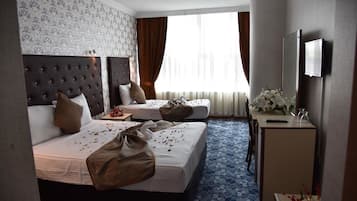 Standard Triple Room | Minibar, desk, iron/ironing board, free WiFi