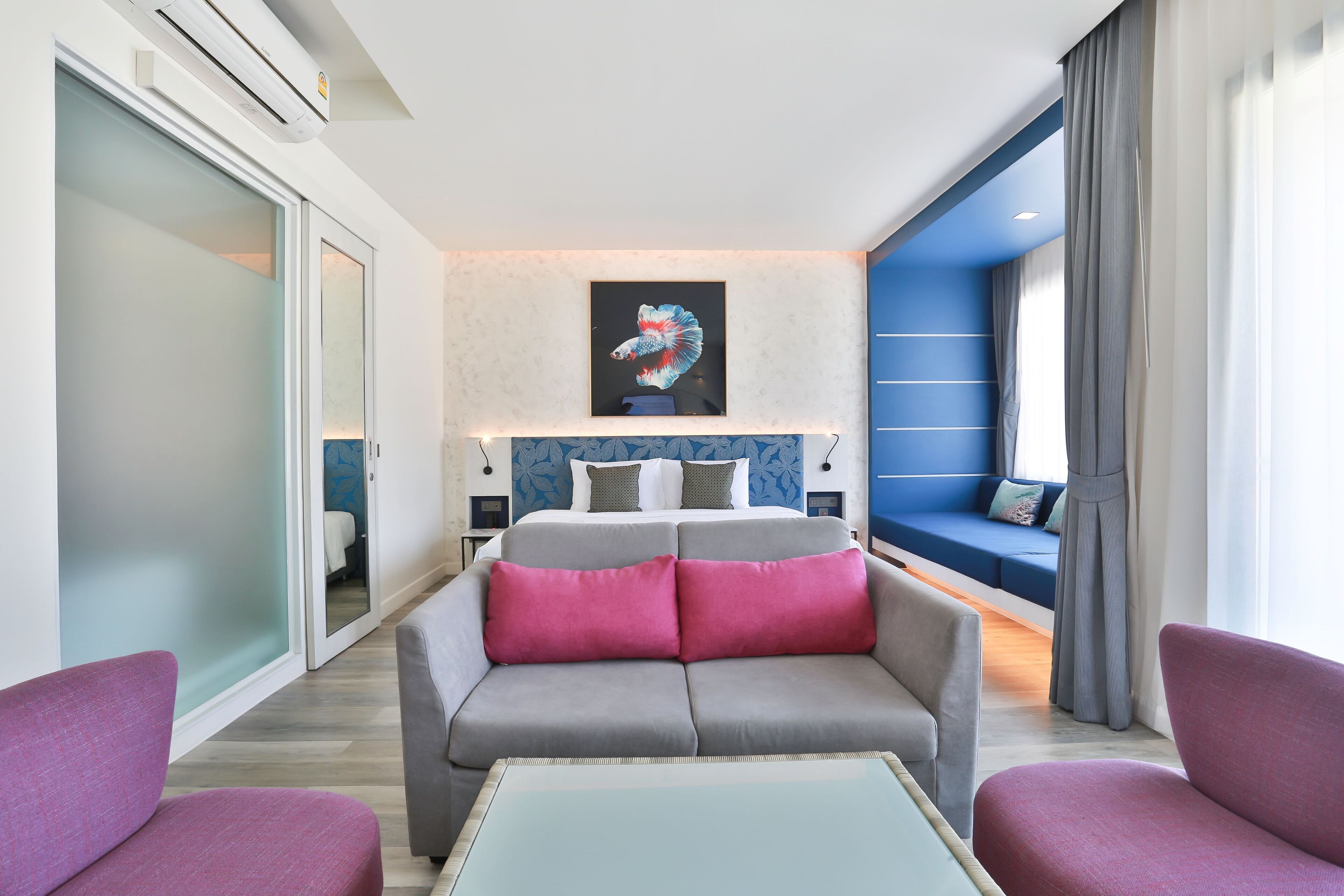 signature suite | living area | 43-inch tv with cable channels