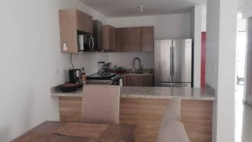 Townhouse Eksekutif, 3 kamar tidur, pemandangan resor | Area keluarga | Televisi layar datar 40-inci dengan saluran TV kabel, TV, dan Netflix