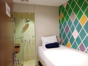 Chambre simple, salle de bain privée | Système d’insonorisation, accès au Wi-Fi (inclus)
