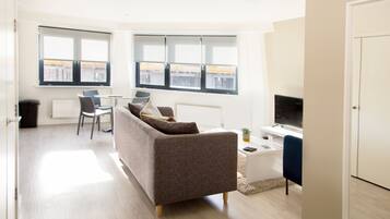 Executive Apartment, 2 Bedrooms | Living area | 40-inch flat-screen TV with cable channels, TV, DVD player