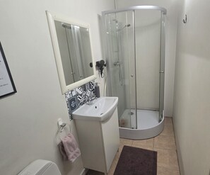 Estudio familiar | Baño | Ducha y cabezal de ducha tipo lluvia