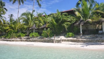 Private beach, white sand, free beach cabanas, sun loungers