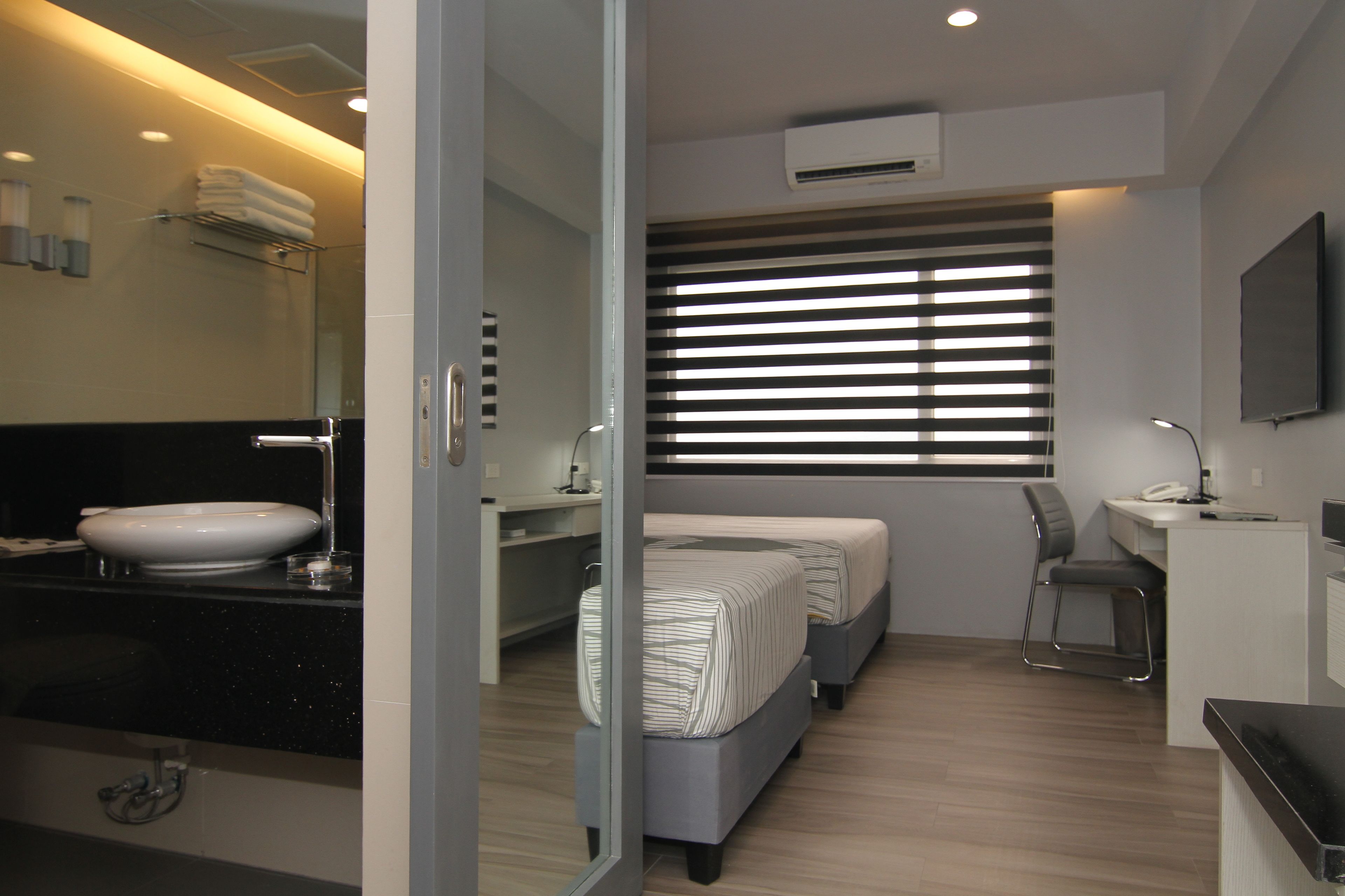 luxe room | minibar, desk, laptop workspace, iron/ironing board