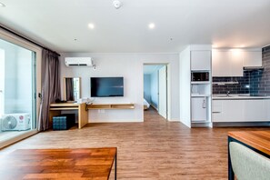 Deluxe Family | Wohnbereich | 50-Zoll-Smart-TV mit Kabelempfang, Fernseher, Netflix