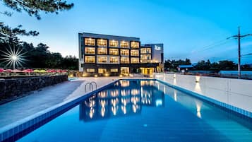 2 outdoor pools, open 10:00 AM to 8:00 PM, pool loungers
