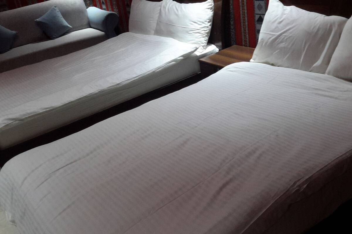 Premium bedding, memory foam beds, in-room safe, blackout drapes