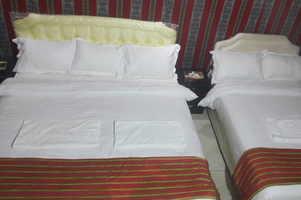 Premium bedding, memory foam beds, in-room safe, blackout drapes