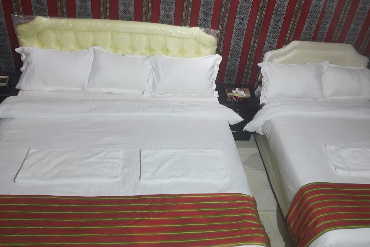 Premium bedding, memory foam beds, in-room safe, blackout drapes