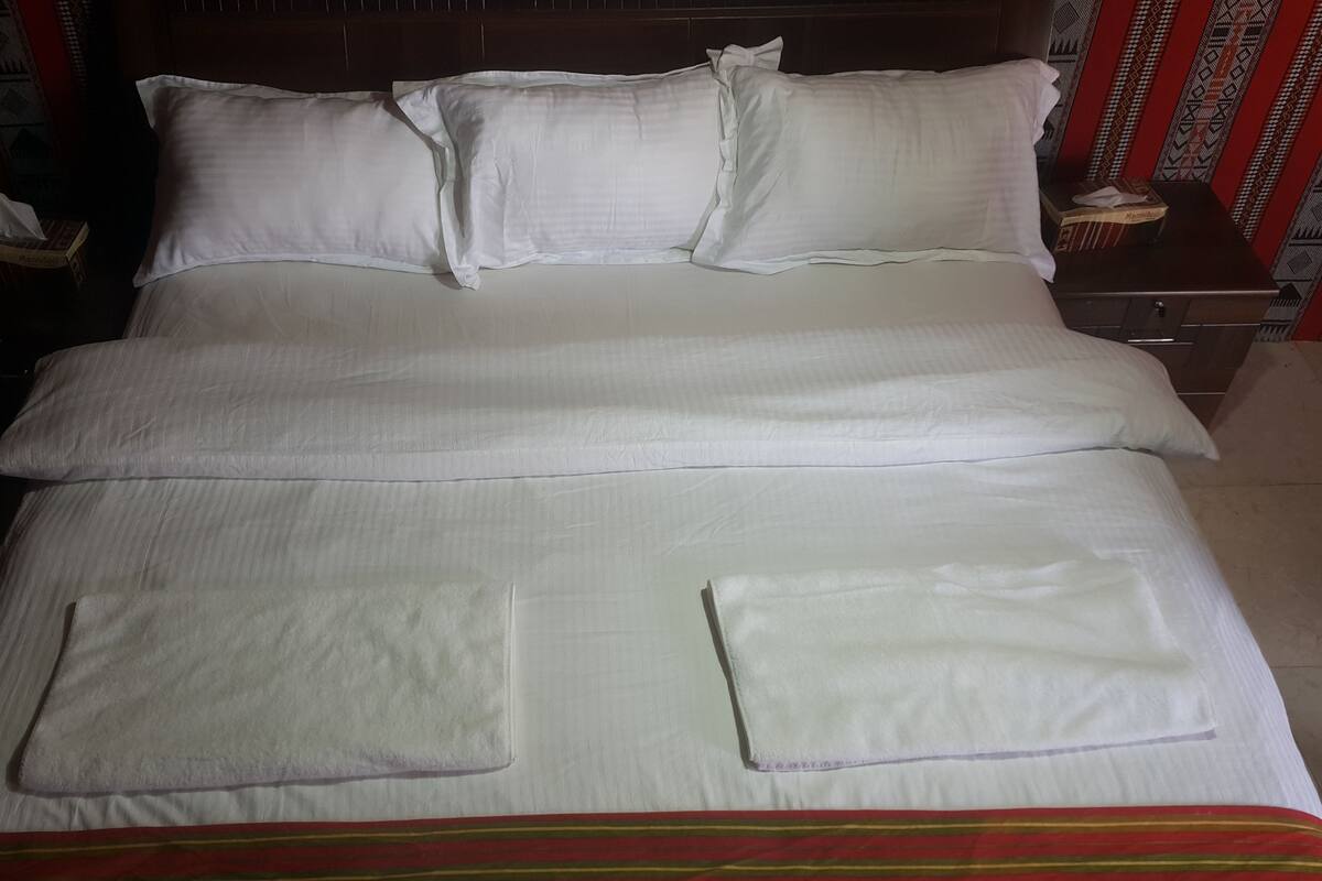 Premium bedding, memory foam beds, in-room safe, blackout drapes