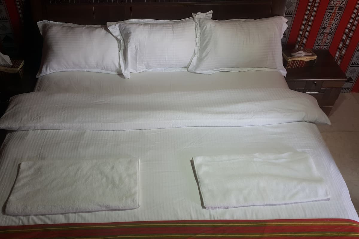 Premium bedding, memory foam beds, in-room safe, blackout drapes