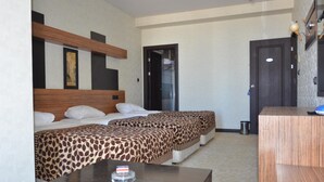 Minibar, coffre-fort, bureau, accès au Wi-Fi (inclus)
