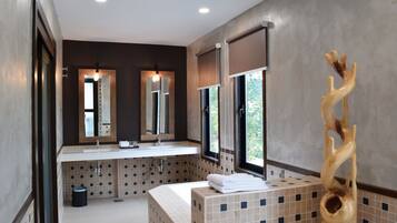 Signature Suite, 1 Bedroom, Non Smoking, Bathtub | Bathroom | Separate bathtub and shower, deep-soaking bathtub, free toiletries