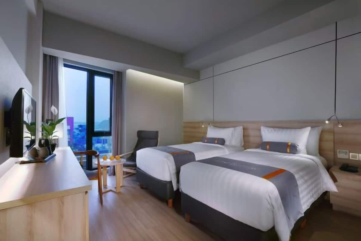 Ropa de cama de alta calidad, minibar, caja fuerte y escritorio
