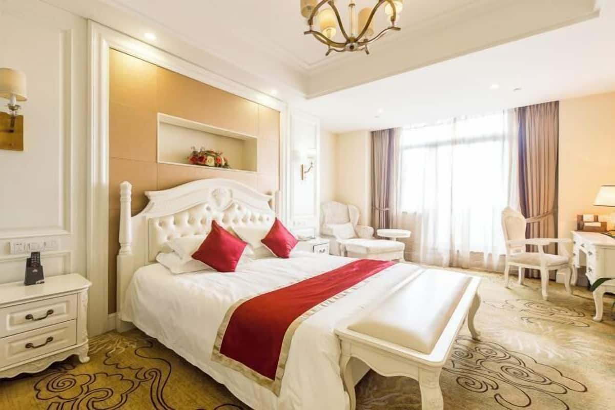 Minibar, desk, blackout drapes, iron/ironing board