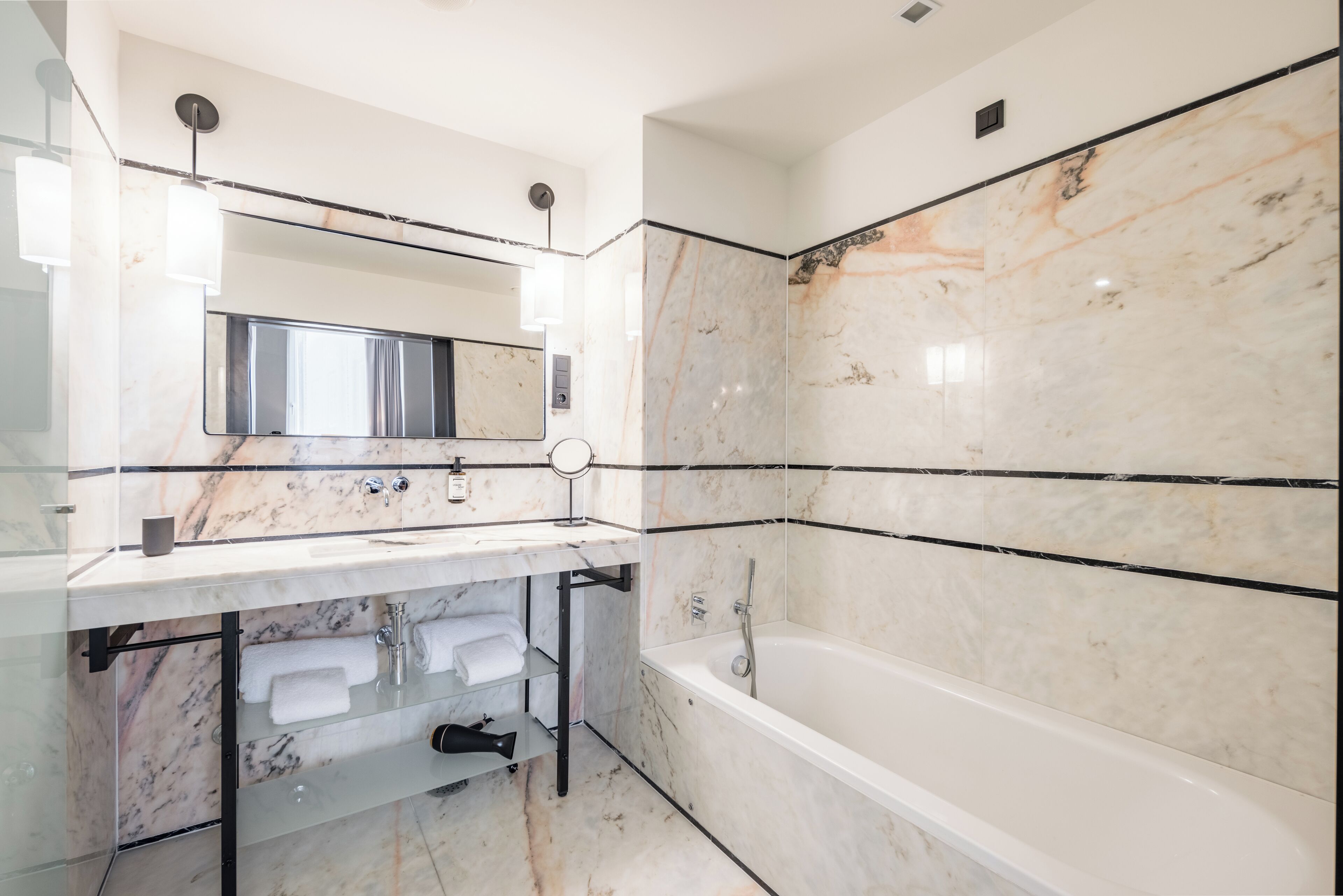 deluxe room | bathroom | free toiletries, hair dryer, bathrobes, towels